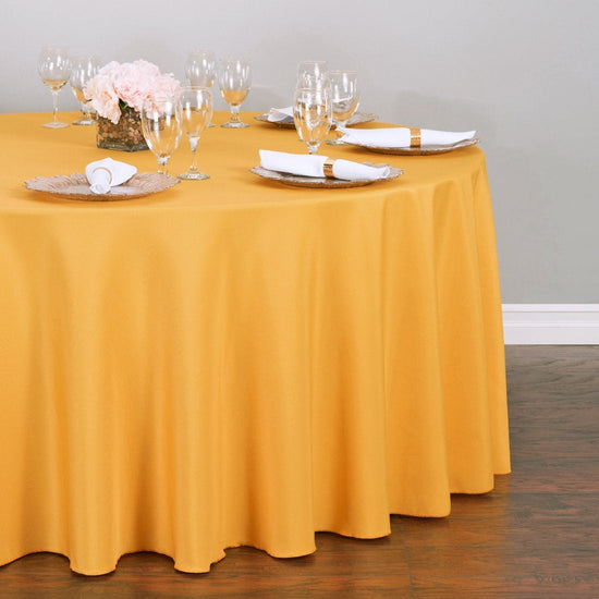 132 in. Round Polyester Tablecloth Gold