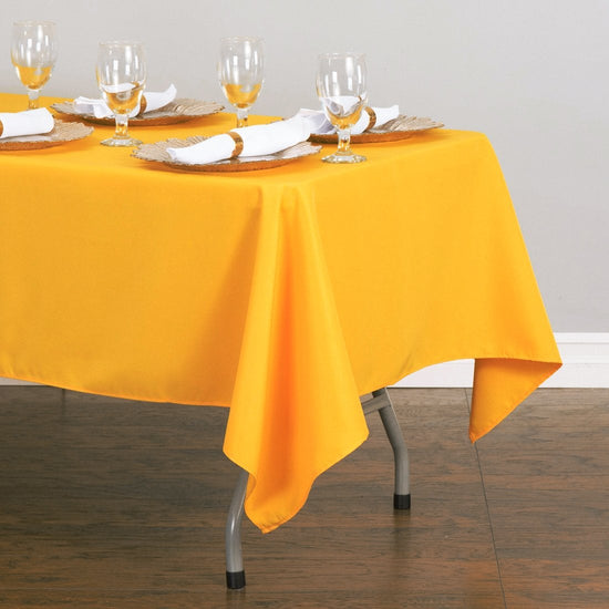 60 x 126 in. Rectangular Polyester Tablecloth Gold