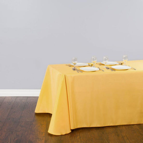 90 x 132 in. Rectangular Polyester Tablecloth Gold